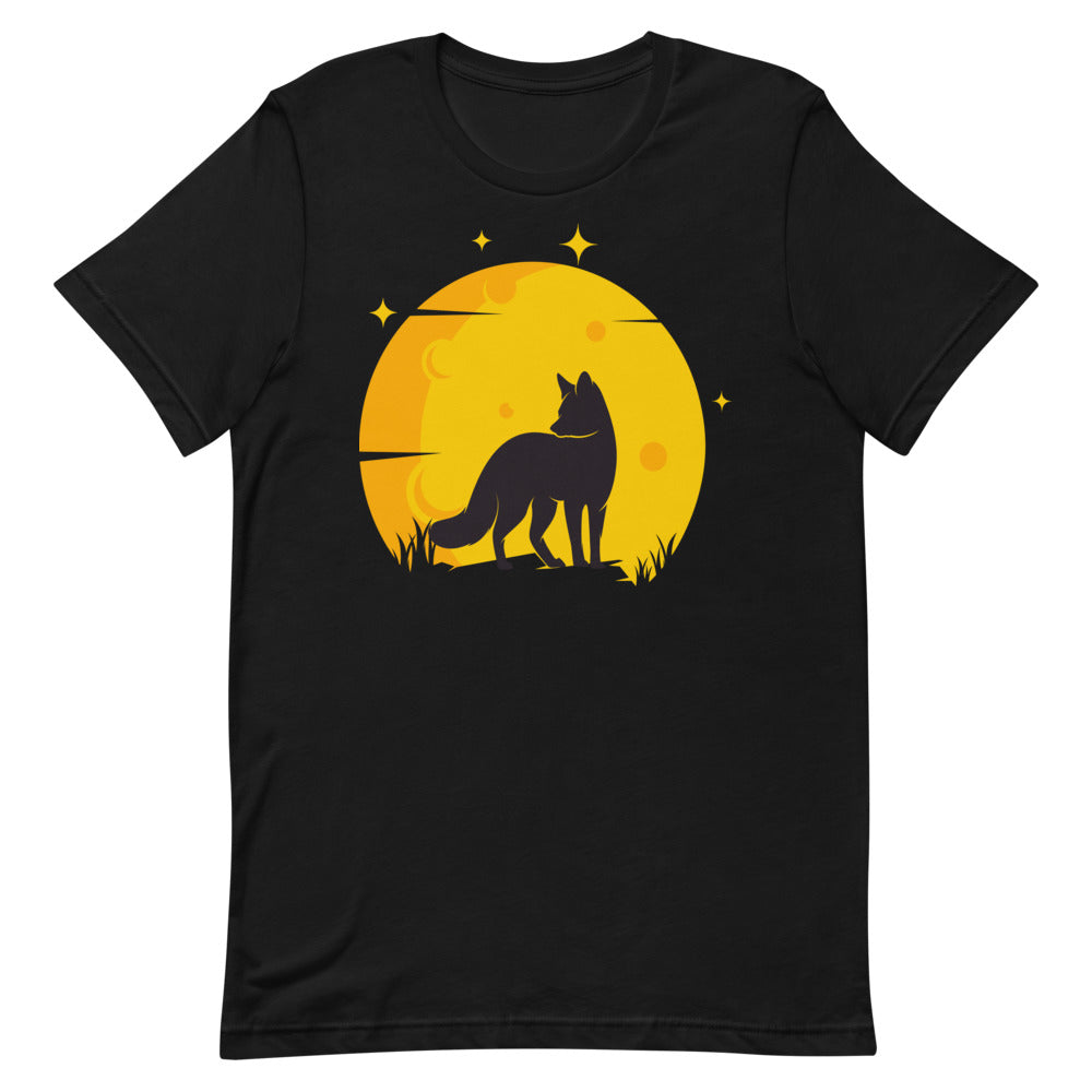 T-shirt noir unisexe avec un design bohème d’un loup noir en silhouette hurlant devant une pleine lune jaune et orange, avec des étoiles et des herbes en bas.