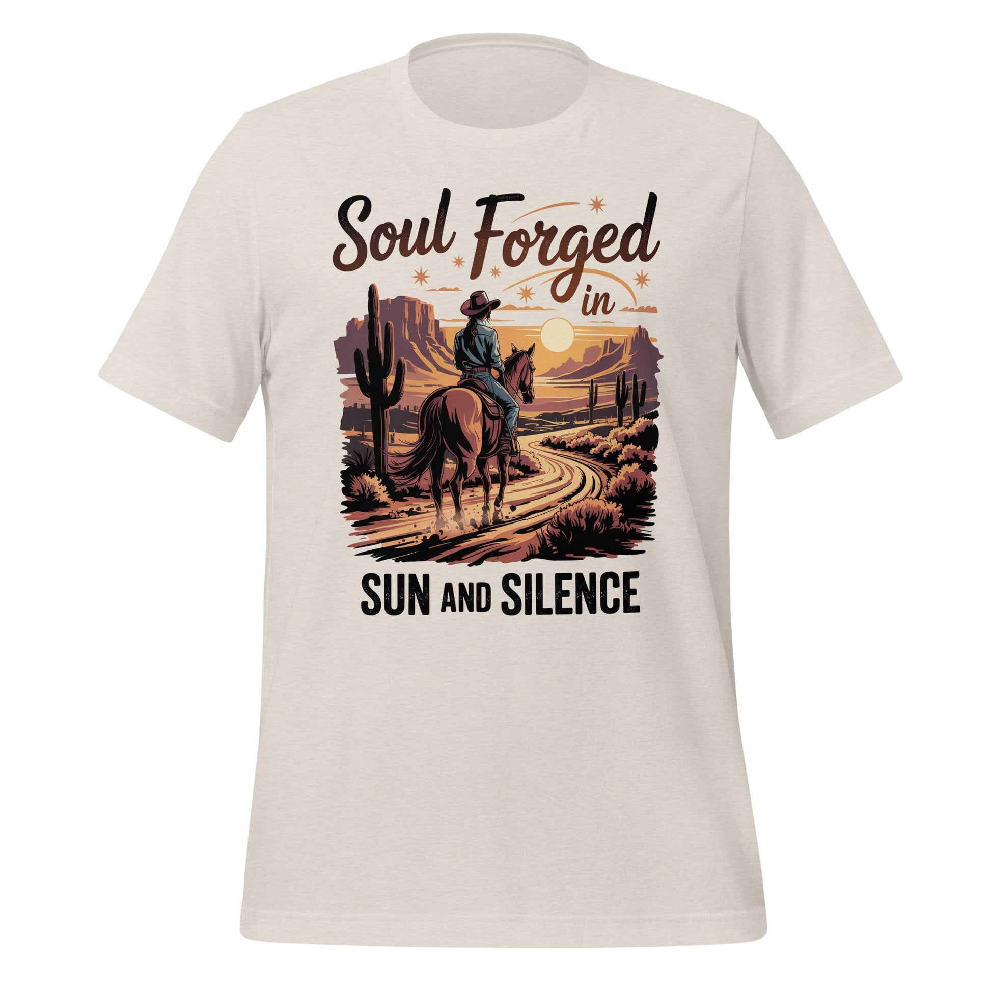 T-shirt unisexe beige avec un design western "Soul Forged in Sun and Silence", cowboy à cheval dans un désert, style poétique.