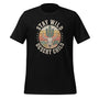 T-shirt unisexe noir avec un design rétro western "Stay Wild Desert Child", crâne de taureau, cactus et coucher de soleil.
