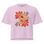T-shirt épais boxy rose avec motif floral multicolore au recto, 100% coton américain, style artistique décontracté.