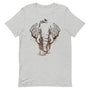 T-shirt gris clair unisexe avec un design bohème d’un éléphant brun formé par des branches d’arbres, avec trois oiseaux noirs perchés sur les branches.